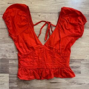 Elegant Red Blouse with Ruffled Hem